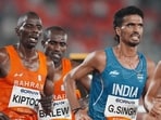 Bahrain's Albert Kiptoo, Birhanu Balew and India's Gulveer Singh (right) compete in the men's 10,000m final at the Asian Games in Nagoya, Japan. (AP Photo/Lee Jin-man)