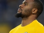 Green Bay Packers' Micah Parsons watches warm ups before an NFL football game against the Atlanta Falcons in Green Bay. 