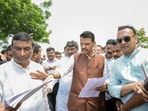 Maharashtra Chief Minister Devendra Fadnavis interacts with people while inspecting the areas affected by a drought-like situation in Washim on Thursday. (@CMOMaharashtra X)