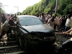Navi Mumbai, India - Sept. 24, 2026:Honda City Plunges Onto Belapur-Uran Railway Tracks near CBD Belapur Station, local train services disrupted at CBD Belapur in Navi Mumbai, India, on Thursday, September 24, 2026. (Photo by Bachchan Kumar/ Hindustan Times) (Hindustan Times)