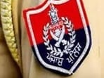 One of the men, dressed in police-like attire was tied to a pole and being beaten up. (HT File)