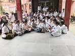 Outsourced employees stage a protest at the hospital in Kaushambi on Thursday (HT) Outsourced employees stage a protest at the hospital in Kaushambi on Thursday (HT)