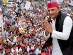 Samajwadi Party chief Akhilesh Yadav greets supporters while leading a roadshow ahead of the 2027 Uttar Pradesh Assembly elections in Rae Bareli, Uttar Pradesh.