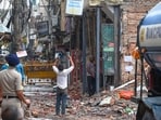 MCD Workers demolish the  'Dangerous' building Adjacent  of collapsed PG at Satya Niketan.
