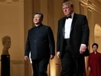 US President Donald Trump and China's President Xi Jinping arrive for a State Dinner in the East Room of the White House in Washington, DC. (AFP)