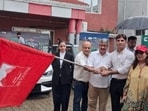 The event witnessed enthusiastic participation from local EV enthusiasts and environmental activists navigating a fleet of electric cars. (HT Photo)