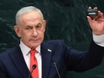 Israel's Prime Minister Benjamin Netanyahu holds up a pager as he speaks during the 81st United Nations General Assembly at the United Nations Headquarters in New York, on September 24, 2026. 