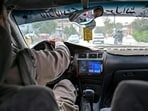A radio can be seen in an taxi transporting passengers in Kabul(AFP)