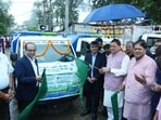 Uttarakhand Chief Minister Pushkar Singh Dhami flags off vehicles for solid and liquid waste management in Khatima.