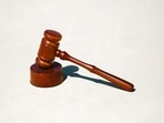 Shannon Burns was dismissed after losing her room key and sleeping in a sauna while on a work trip.