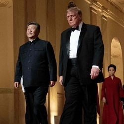 US President Donald Trump and China's President Xi Jinping arrive for a State Dinner in the East Room of the White House in Washington, DC. 