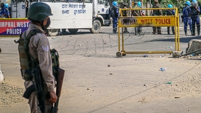 Manipur Police personnel stand guard during a general strike. (ANI)