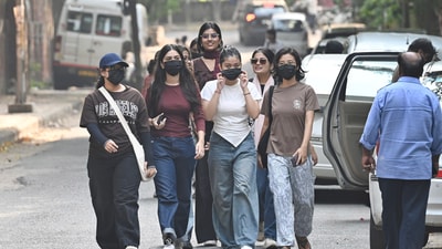 Students walk home through a dark and poorly lit stretch near Lady Shri Ram College (LSR), amid growing concerns over women’s safety in and around the college area. (Sanchit Khanna/ HT Photo)