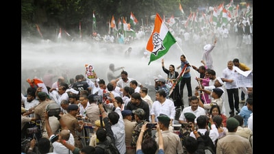 Police use water cannons to stop the Bihar Pradesh Congress Committee members and supporters during a protest march in Patna, Friday. (SANTOSH KUMAR/HT) Police use water cannons to stop the Bihar Pradesh Congress Committee members and supporters during a protest march in Patna, Friday. (SANTOSH KUMAR/HT)
