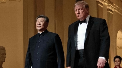 US President Donald Trump and China's President Xi Jinping arrive for a State Dinner in the East Room of the White House in Washington, DC. (AFP) US President Donald Trump and China's President Xi Jinping arrive for a State Dinner in the East Room of the White House in Washington, DC. (AFP)