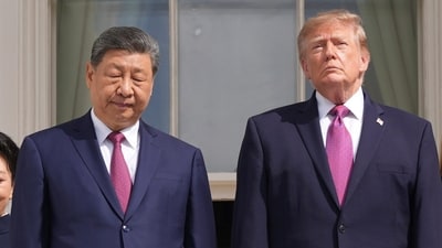Trump’s apparent AI-altered Xi photo raised concerns as Xi stressed limits on US-China competition during his Washington visit. (AP)