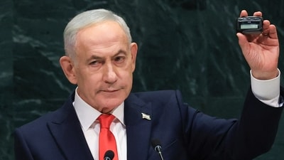 Israel's Prime Minister Benjamin Netanyahu holds up a pager as he speaks during the 81st United Nations General Assembly at the United Nations Headquarters in New York, on September 24, 2026. (AFP) Israel's Prime Minister Benjamin Netanyahu holds up a pager as he speaks during the 81st United Nations General Assembly at the United Nations Headquarters in New York, on September 24, 2026. (AFP)