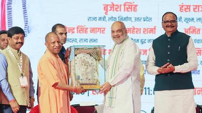 Union home and cooperation minister Amit Shah being felicitated by chief minister Yogi Adityanath at the fourth edition of the UP International Trade Show (UPITS 2026) at the India Expo Centre and Mart, in Greater Noida on Friday. Deputy chief minister Brajesh Pathak and UP cabinet minister Nand Gopal Gupta Nandi also present. (ANI PHOTO)