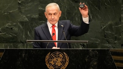 Israeli Prime Minister Benjamin Netanyahu holds a device as he speaks speaks during the 81st session of the United Nations General Assembly at United Nations headquarters. (AP) Israeli Prime Minister Benjamin Netanyahu holds a device as he speaks speaks during the 81st session of the United Nations General Assembly at United Nations headquarters. (AP)