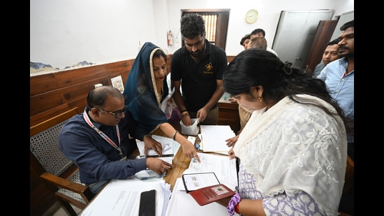 Millions of common people will have to forgo other work, spend hours at a facilitation centre or with their booth-level officers, trying to convince the authorities that an extra alphabet in their name or a typo in their date of birth – commonplace errors in India, made by officials while entering data – doesn’t extinguish their identity (Ishant Chauhan/ Hindustan Times)
