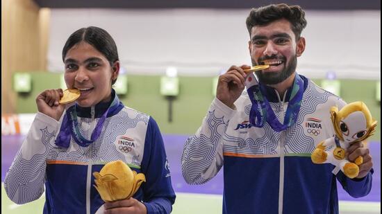 Nagoya: India’s Suruchi Singh, left, and Kamaljeet celebrate after winning Gold medal in the 10 meter air pistol mixed team final in the ongoing Asian Games 2026, in Nagoya, Japan, Friday, Sept. 25, 2026. (PTI Photo/Atul Yadav) (PTI09_25_2026_000097B) (PTI)