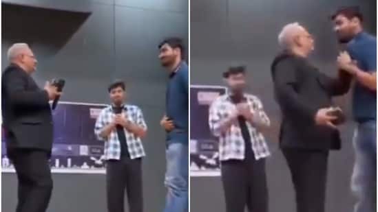 As seen a video now going viral, the visibly irked professor called the student on stage and grabbed him by the collar. (Screengrab from X)