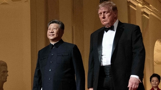 US President Donald Trump and China's President Xi Jinping arrive for a State Dinner in the East Room of the White House in Washington, DC. (AFP)