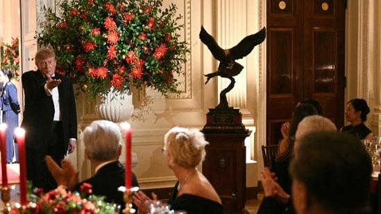 During a Washington state dinner, Trump presented Xi with a bald eagle sculpture, reflecting America's spirit. The event featured a unique menu merging American and Chinese influences. (AFP)