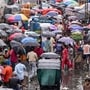 Kolkata: People wade through a busy local market during rain triggered by a weather system over the Bay of Bengal, in Kolkata, Thursday, Sept. 24, 2026. (PTI Photo/Swapan Mahapatra)(PTI09_24_2026_000199B)
