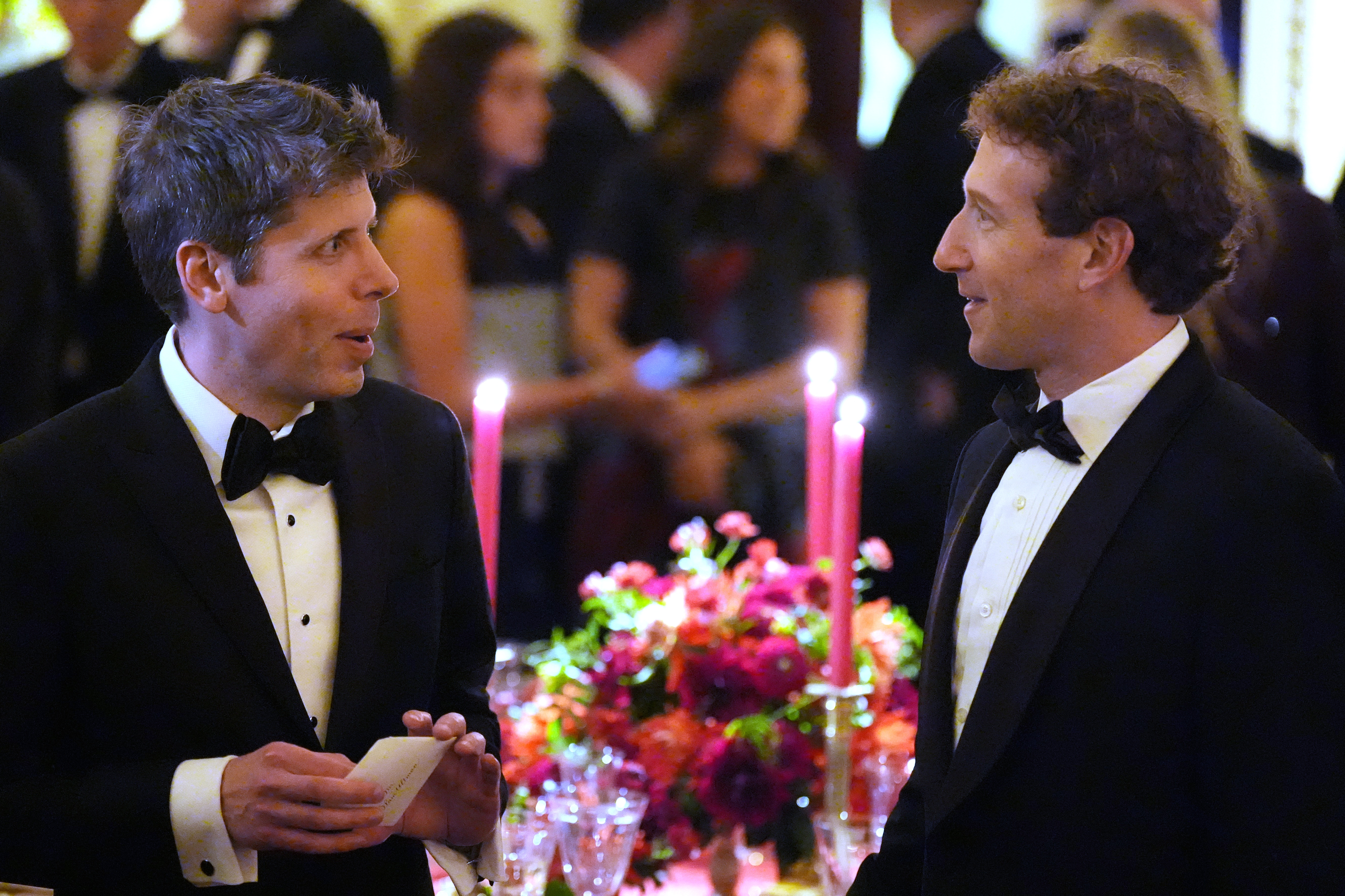 OpenAI CEO Sam Altman talks with Facebook CEO Mark Zuckerberg as President Donald Trump hosts a State Dinner for China's President Xi Jinping in the East Room of the White House, Thursday. (AP) OpenAI CEO Sam Altman talks with Facebook CEO Mark Zuckerberg as President Donald Trump hosts a State Dinner for China's President Xi Jinping in the East Room of the White House, Thursday. (AP)