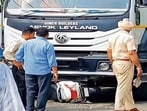 A police official inspecting the accident site on Mall Road in Ludhiana. (HT)