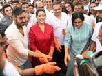 Actor Ajay Devgn with Amruta Fadnavis during the Juhu Beach clean-up drive