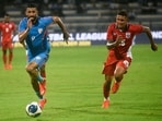 India's Manvir Singh (L) dribbles as Panama's Joseph Edward Jones Cordoba defends during an international friendly in Bengaluru on Friday.