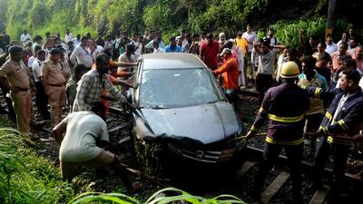Navi Mumbai, India - Sept. 24, 2026:Honda City Plunges Onto Belapur-Uran Railway Tracks near CBD Belapur Station, local train services disrupted at CBD Belapur in Navi Mumbai, India, on Thursday, September 24, 2026. (Photo by Bachchan Kumar/ Hindustan Times) (Hindustan Times)