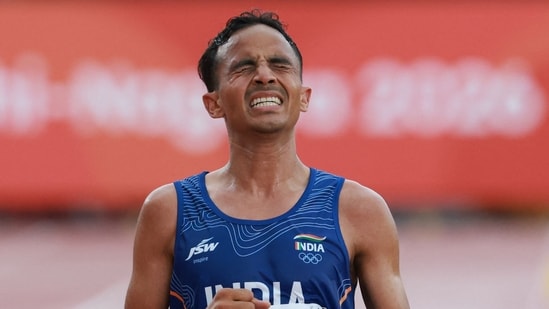 India's Sawan Barwal crosses the finish line to finish second in the men's marathon final during the 2026 Asian Games at Nagoya City Mizuho Park Athletic Stadium in Nagoya, Aichi Prefecture on September 26, 2026.