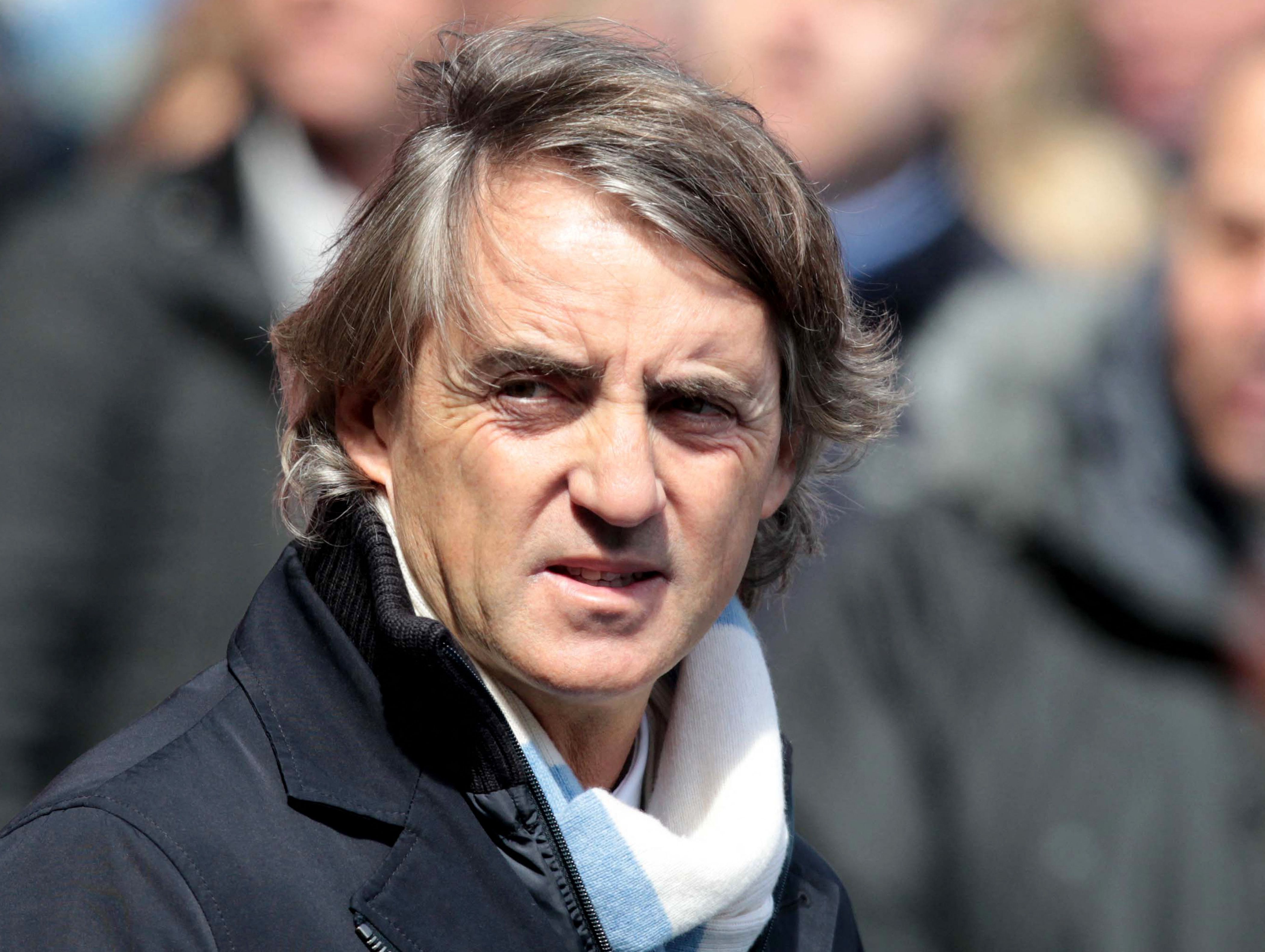 Documents purportedly showed off-the-books payments to Mancini, City's manager at the time, through consultancy fees from Al Jazira, another club owned by Sheikh Mansour. (AFP)