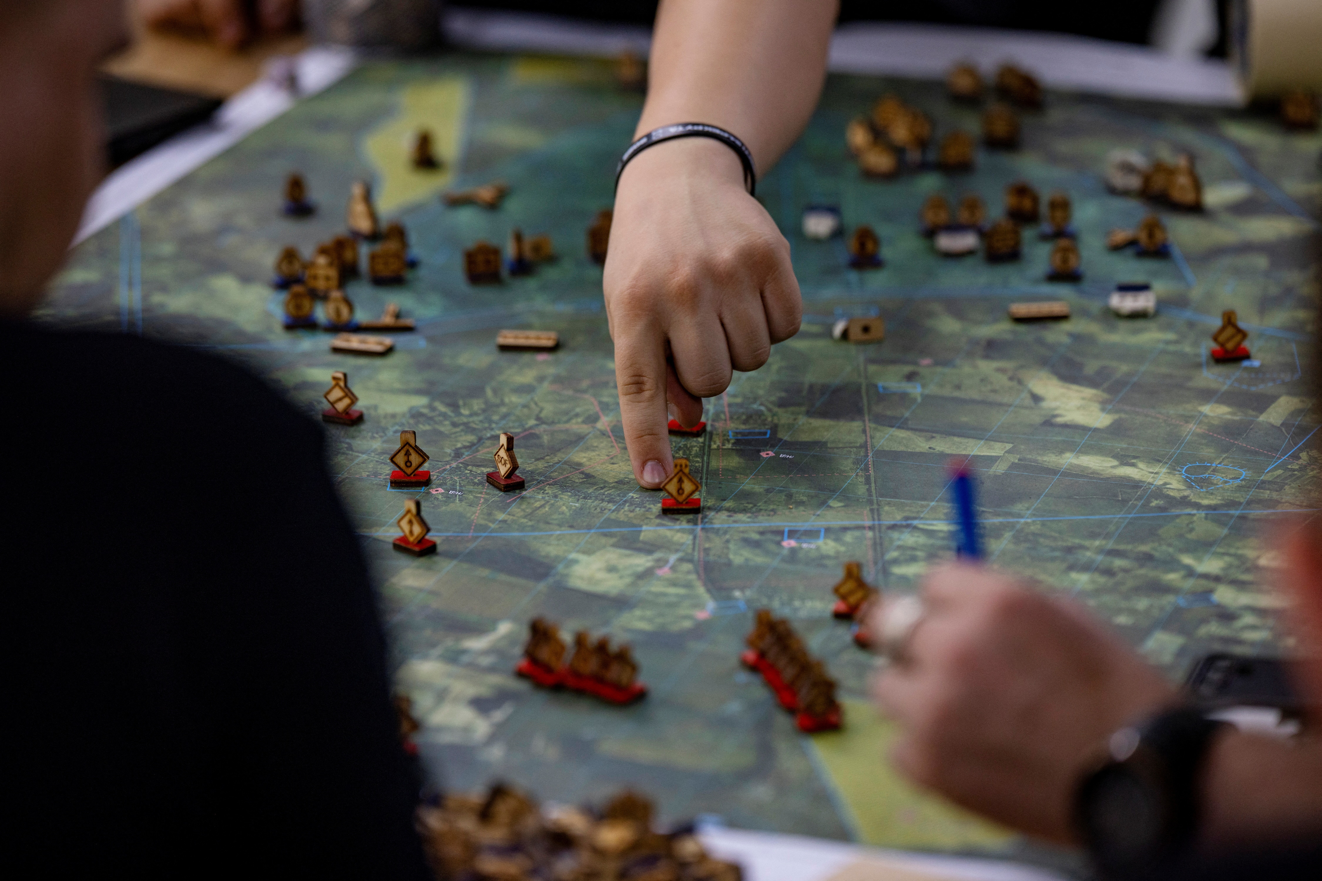 Front-line officers and military instructors take part in a wargaming exercise during a 12-week Nato-style tactical planning and command programme, amid Russia’s attack on Ukraine, in Kyiv, (Reuters Photo)