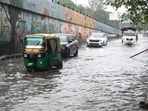 A waterlogged road in Puraniya area of Lucknow. (HT Photo)