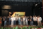 Himachal Pradesh governor Kavinder Gupta (in chequered blazer) with filmmakers and organisers of the 12th International Film Festival of Shimla. 