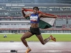 India's Ancy Sojan celebrates after winning silver medal in the women's long jump final event at the ongoing 20th Asian Games, in Nagoya, Japan. (PTI)