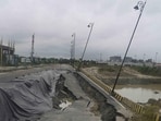 Large stretch of road caved in near Ekana Stadium following three days of continuous rainfall in Lucknow on Sunday. (Deepak Gupta/HT)
