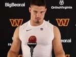 Leo Chenal of the Washington Commanders speaks with the media during a joint practice at BigBear.ai Performance Center on August 12.