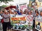 The protesters outside Elante Mall in Chandigarh on Saturday. (HT Photo)
