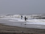 Surfers turn out at Rockaway Beach as a Nor'easter storm brings large waves to area beaches on September 27, 2026, in New York City. New York City and much of the Northeast are experiencing a weekend of high winds, rain, and flooding in numerous coastal communities as the storm passes through.   