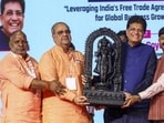Uniin minister Piyush Goyal with UP minister Bhupendra Chaudhary and others at the UP International Trade Show in Greater Noida on Sunday. (PTI)
