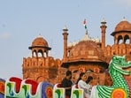 Gram it: Visitors enjoy pleasant weather while taking to swings at the Red Fort after rainfall brought down temperatures and improved AQI across the Delhi-NCR region, 