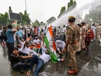 Police use water cannon to disperse Congress workers during a protest rally against the State Election Commission over alleged unilateral decisions by Chief Election Commissioner Gyanesh Kumar in Patna on Friday.