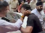 The man who was allegedly slapped later sought disciplinary action against the minister and claimed that an FIR had been registered in connection with the incident.