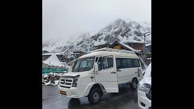 A tourist vehicle moving through the snow covered area at Chitkul in Kinnaur district on Sunday. (Deepak Sansta) A tourist vehicle moving through the snow covered area at Chitkul in Kinnaur district on Sunday. (Deepak Sansta)