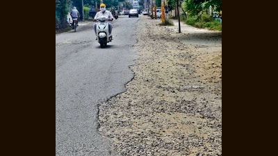 Commuters facing problem while driving due to damaged road in Dugri area due to pipe laying in Ludhiana. (Gurpreet Singh/Hindustan Times) Commuters facing problem while driving due to damaged road in Dugri area due to pipe laying in Ludhiana. (Gurpreet Singh/Hindustan Times)